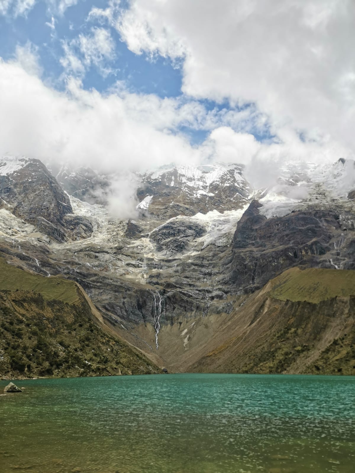 The blue water and white glacier of Humantay lake
